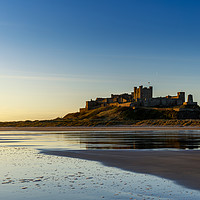Buy canvas prints of Sunrise over Bamburgh Castle by Phill Thornton