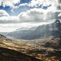 Buy canvas prints of Panoramic of the Black and Red Cuillin mountains  by Phill Thornton