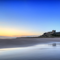 Buy canvas prints of Sunrise over Bamburgh Castle No. 2 by Phill Thornton