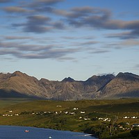 Buy canvas prints of Sunset over the Black Cuillin ridge.  by Phill Thornton