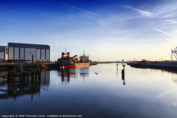 Early morning sunshine over Middlesbrough Docks Picture Board by Phill Thornton
