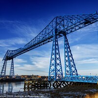 Buy canvas prints of Blue skies above the Tees Transporter bridge. by Phill Thornton