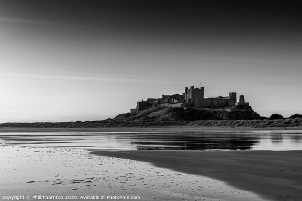 sunrise over Bamburgh Castle (B&W) Picture Board by Phill Thornton