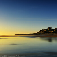 Buy canvas prints of Sunrise over Bamburgh Castle No. 4 by Phill Thornton