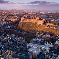 Buy canvas prints of Sunrise over Edinburgh Castle by Richard Nicholls
