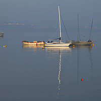 Buy canvas prints of Boats moored in the harbour by Steve Mantell