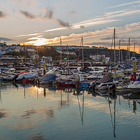 Buy canvas prints of Sunset in Brixham harbour marina by Steve Mantell