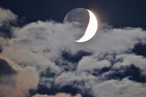 Cloudy Crescent Moon with Earthshine Picture Board by Susan Snow