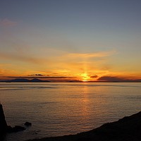 Buy canvas prints of Silhouette and Sunset at Neist Point, Isle of Skye by Susan Snow