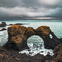 Buy canvas prints of The Gatklettur Lava Arch by David Thurlow