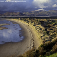 Buy canvas prints of Winter comes to Harlech Beach by David Thurlow