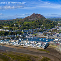 Buy canvas prints of The idyllic harbour town of Porthmadog, gateway to by David Thurlow