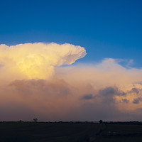 Buy canvas prints of Cumulonimbus cloud and rising moon by Jon Sparks