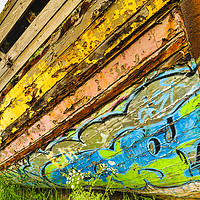 Buy canvas prints of Graffiti on old boat by Jon Sparks