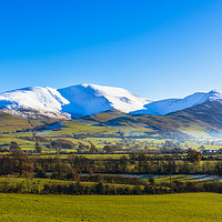 Buy canvas prints of Snow on Skiddaw and Ullock Pike by Jon Sparks