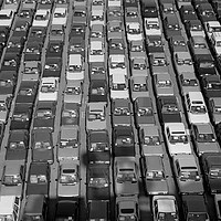 Buy canvas prints of Endless Lines of Exported Cars by Ben Delves