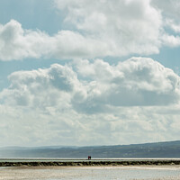 Buy canvas prints of A couple and the clouds at West Kirby by Ben Delves