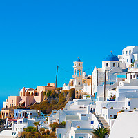 Buy canvas prints of Whitewashed Santorini against the deep blue sky by Madhurima Ranu