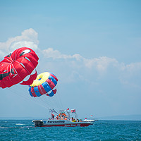 Buy canvas prints of Parasailing in Bali by Madhurima Ranu