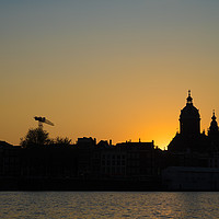 Buy canvas prints of Sunset over Amsterdam by Madhurima Ranu