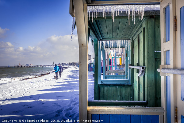 Icicles through the Beach Huts on a Winters day Picture Board by GadgetGaz Photo