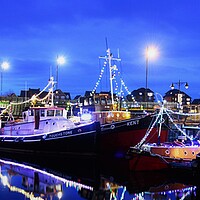 Buy canvas prints of St Mary's Island barges at night by stuart bingham