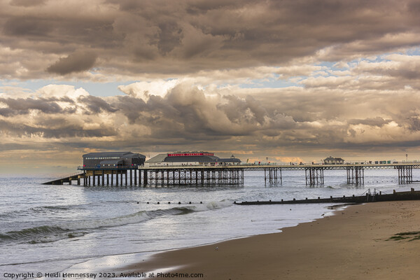 Cromer Pier in the Evening Sun as a Storm rolled i Picture Board by Heidi Hennessey