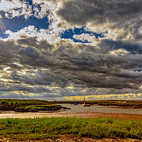 Buy canvas prints of Moody Skies over Brancaster Staithe by Heidi Hennessey