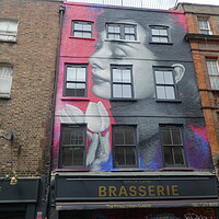 Buy canvas prints of Vibrant Brick Lane Graffiti by Simon Hill