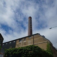 Buy canvas prints of Towering chimney in the Heart of Brick Lan by Simon Hill