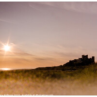 Buy canvas prints of Bamburgh Castle by Peter Anthony Rollings