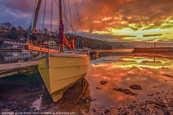 Fiery Sunset over a Cornish Shrimper Picture Board by Ian Stone