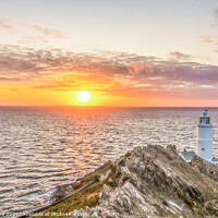 Buy canvas prints of Start point lighthouse at sunrise by Ian Stone