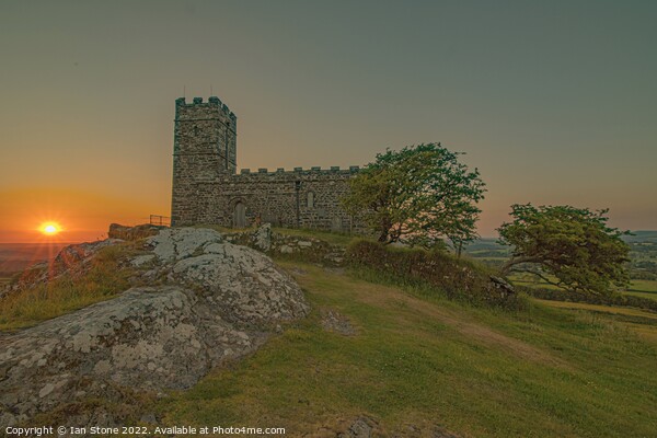 Majestic Brentor Church Silhouetted at Sunset Picture Board by Ian Stone