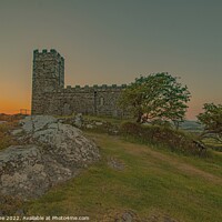Buy canvas prints of Majestic Brentor Church Silhouetted at Sunset by Ian Stone