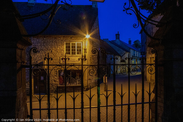Lamplight in Stow on the Wold  Picture Board by Ian Stone