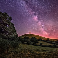 Buy canvas prints of Glastonbury Tor under the Stars and Milky Way by Thomas Russell
