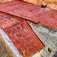 Buy canvas prints of Mahon rooftops by Rosaline Napier