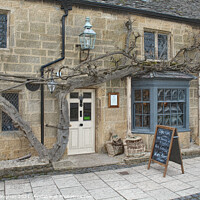 Buy canvas prints of A Quaint Coffee Haven in the Heart of Cotswolds by Kevin Maughan