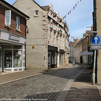 Buy canvas prints of The Charm of Hexham's Street Life by Kevin Maughan