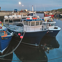 Buy canvas prints of Seahouses Harbour by Kevin Maughan