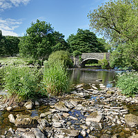 Buy canvas prints of The Rocky Stream to Old Stone Bridge by Philip Brown