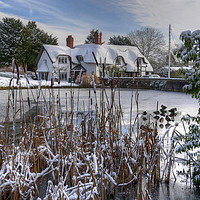 Buy canvas prints of The old English cottage in winters Snow by Philip Brown
