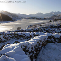 Buy canvas prints of Wales in Winters Snow looking towards Mt Snowdon by Philip Brown