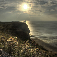 Buy canvas prints of Sun setting across Worms Head, Rhosilli, The Gower by Philip Brown