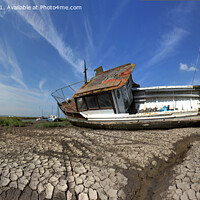 Buy canvas prints of Old Decaying Boat on Beach in The Wirral by Philip Brown