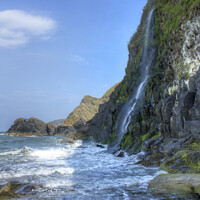 Buy canvas prints of The Waterfall cascades into the sea at Tresaith, S by Philip Brown