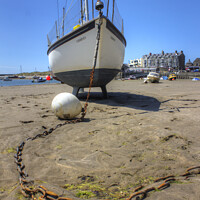 Buy canvas prints of Boat on sandy beach at Barmouth by Philip Brown