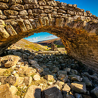 Buy canvas prints of An Old Stone Archway at Old Gang Mill by David Brookens