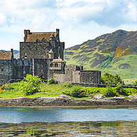 Buy canvas prints of Eilean Donan Castle - A Historical and Serene Beau by Duncan Loraine